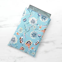 Fancy floral (lt. blue) - padded book sleeve, book pouch