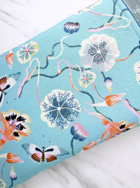 Fancy floral (lt. blue) - padded book sleeve, book pouch