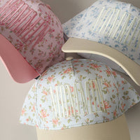MOMMIN' Embroidered Flower PatternTrucker Hat
